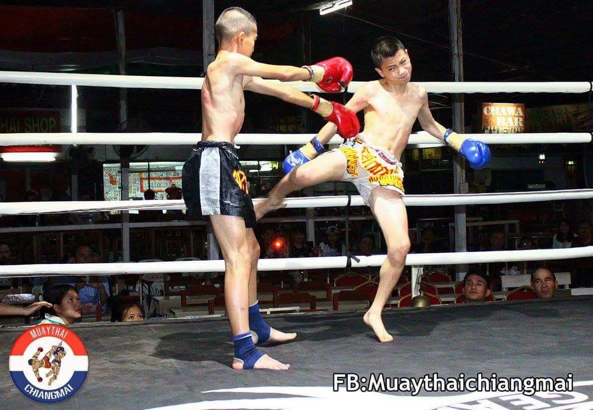 Joker as a young boy fighting in a Muay Thai match in Chiang Mai